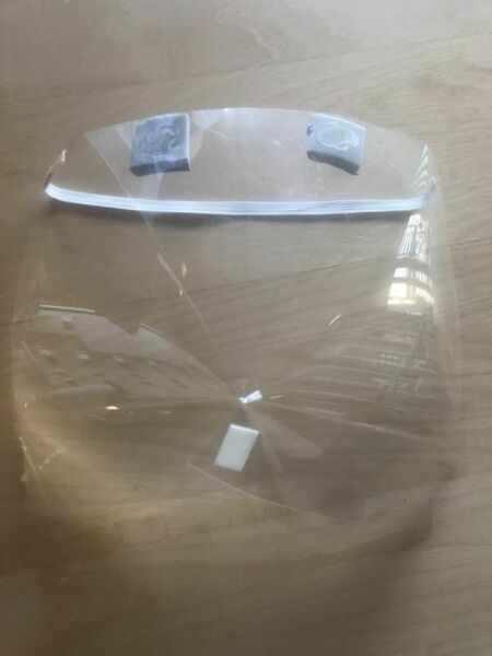 Face shield on a desk.